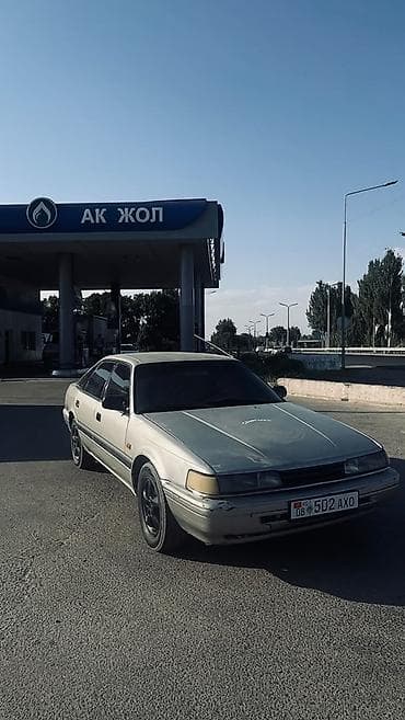 Mazda 626: 1989 г., 2 л, Кол менен иштөөчү, Лифтбек — 4