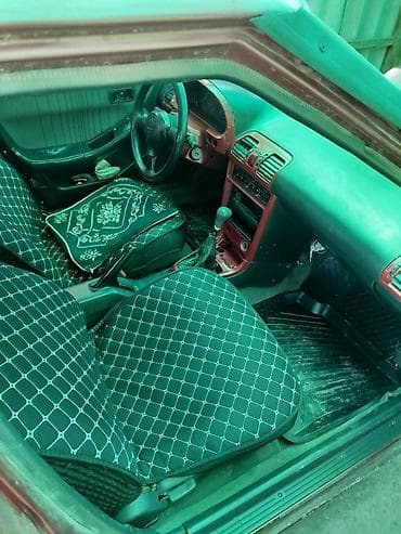 Продажа авто: Mazda 323: 1993 г., 1.6 л, Ручные, Бензин, Седан — 5