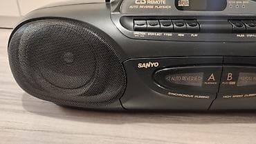 магнитола для авто: 2 аппарата фирма SANYO MCD - Z51, бумбокс полностью рабочий, нужна — 2