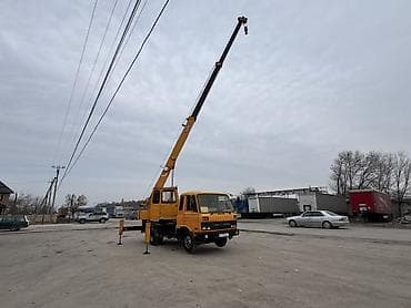 цистерну 16 кубов: Автокран, Nissan, 1994 г., 21 м — 10