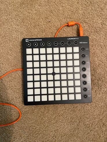принтер портативный: MIDI-контроллер Novation Launchpad с 64 пэдами, чувствительными к — 1