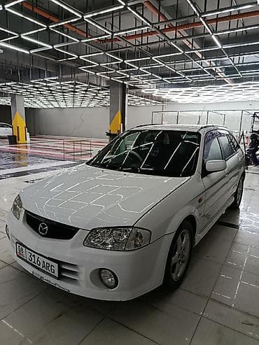 mar x: Mazda Familia: 2001 г., 2 л, Автомат, Бензин, Хэтчбэк — 10