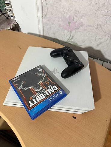Игровая консоль PlayStation 4 Pro (белая) Комплектация: - Консоль PS4