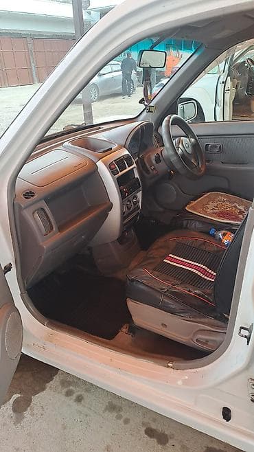 ом 615: Nissan Cube: 2002 г., 1.3 л, Автомат, Бензин, Седан — 10