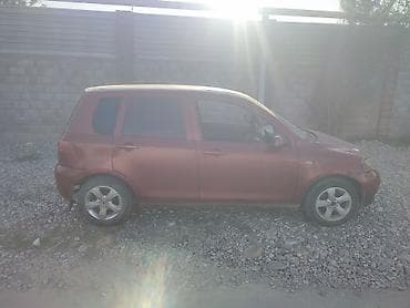 простой: Mazda Demio: 2002 г., Бензин, Хэтчбэк — 4