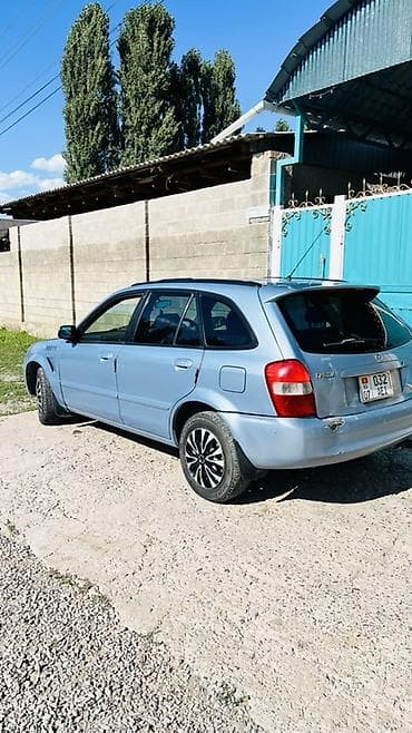 Транспорт: Mazda Familia: 2001 г., 1.5 л, Автомат, Бензин, Универсал — 6