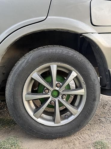 Литые диски R14 (кажется 4/100) с шинами Dunlop - Комплект колес на — 3