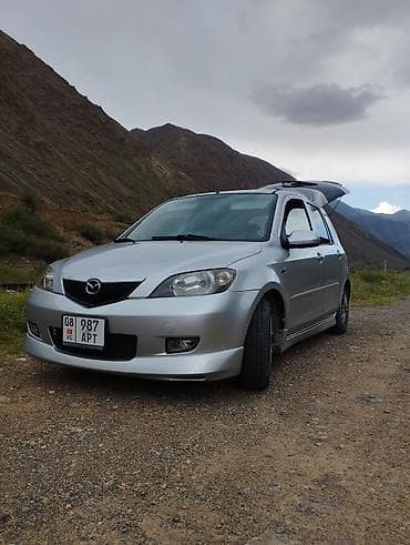 Mazda Demio: 2003 г., 1.3 л, Механика, Бензин, Хэтчбэк — 2