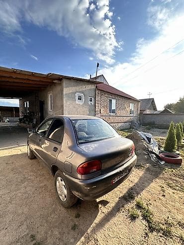 Унаа: Daewoo Nexia: 1991 г., 1.4 л, Кол менен иштөөчү, Бензин, Седан — 3