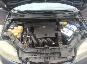 машина не нахаду: Mazda 2: 2004 г., 1.4 л, Механика, Бензин, Хетчбек — 7