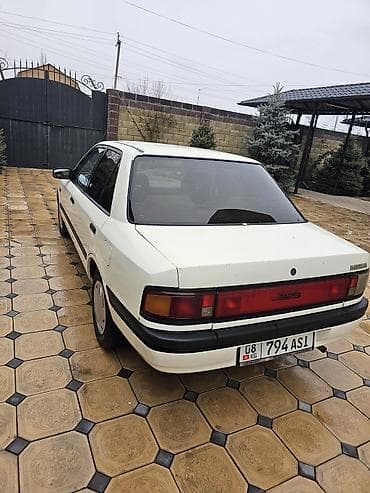 mazda cx 7: Mazda 323: 1989 г., Автомат, Седан — 4