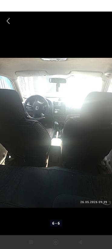 kirgiz auto: Mazda 323: 2002 г., 1.6 л, Механика, Бензин, Хэтчбэк — 5