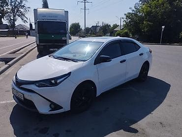 Toyota Corolla: 2017 г., 1.8 л, Автомат, Гибрид, Седан — 5