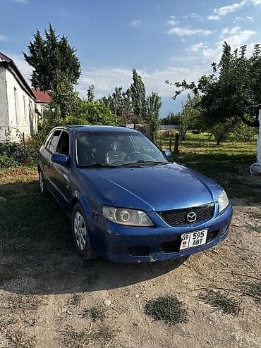 Mazda 323: 2002 г., 1.6 л, Механика, Бензин, Хэтчбэк at lalafo.kg Mazda 323: 2002 г., 1.6 л, Механика, Бензин, Хэтчбэк