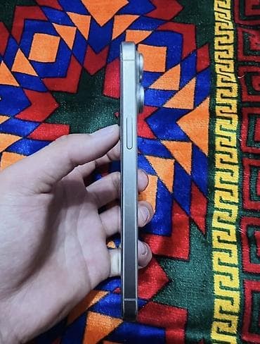IPhone 15 Pro Max (серебряный цвет) Основные особенности: - Корпус из — 2