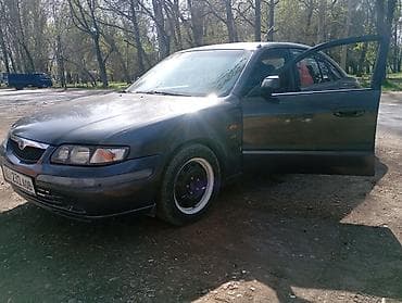 трамблёр мазда 323: Mazda 626: 1997 г., Седан — 6