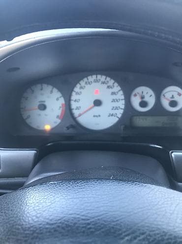 matiz diska: Nissan Primera: 2000 г., 1.8 л, Механика, Бензин, Лифтбек — 10
