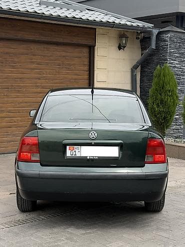 6: Volkswagen Passat: 1998 г., 1.6 л, Механика — 6