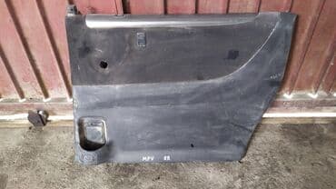 Mazda MPV обшивка двери, Мазда МПВ дверная карта Задняя Правая Ул