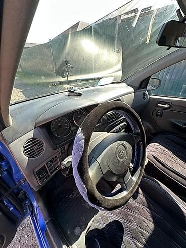 Унаа сатуу: Daihatsu Cuore: 2003 г., 1 л, Кол менен иштөөчү, Бензин, Хетчбек — 4