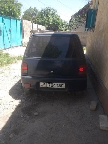 муравей с рулем: Daihatsu Cuore: 1995 г. — 7
