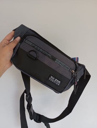 чемодан дорожный бу: Поясная сумка барсетка — 1