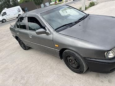Транспорт: Nissan Primera: 1991 г., 1.6 л, Кол менен иштөөчү, Бензин, Седан — 4