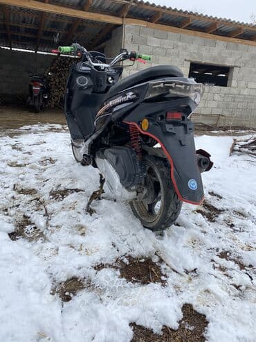 Скутеры: Скутер/максискутер спортивного стиля - Агрессивный дизайн передней — 9