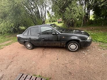 Унаа: Daewoo Nexia: 2009 г., 1.6 л, Кол менен иштөөчү, Бензин, Седан — 3