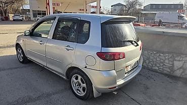 рассрочку автомобиль: Mazda Demio: 2004 г., 1.3 л, Бензин — 6