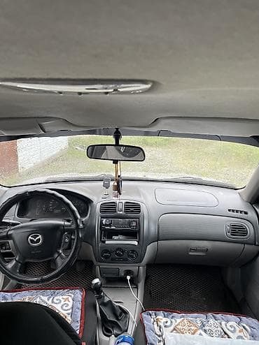 mazda 3: Mazda 323: 2000 г., Механика, Бензин, Универсал — 4