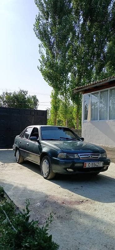 Daewoo Nexia: 1994 г., 1.5 л, Механика, Бензин, Седан