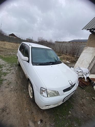 gac aion v: Mazda Demio: 2001 г., 1.3 л, Автомат, Бензин, Универсал — 5