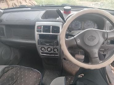 Nissan Cube: 2002 г., 1.3 л, Кол менен иштөөчү, Бензин, Хетчбек — 1
