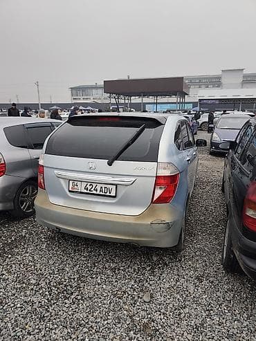 opel astra gtc: Honda FR-V: 2006 г., Механика, Бензин, Минивэн — 5