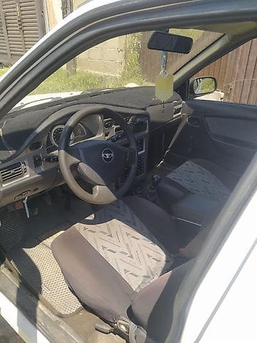 mersedes e: Daewoo Nexia: 2008 г., Механика, Седан — 4