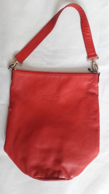 сумка клатч б у: Сумка кожаная. Донышко - круг, диаметр 22 см. Высота сумки 39 см — 1