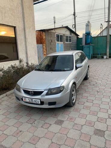 мазда 313: Mazda 323: 2003 г., 1.6 л, Механика, Бензин, Универсал — 1