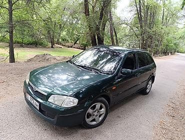 e2 byd: Mazda 323: 2000 г., 1.5 л, Механика, Бензин, Универсал — 3