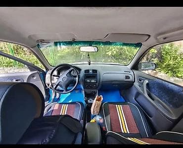 w124 124: Mazda 323: 1999 г., 1.5 л, Механика, Бензин, Универсал — 5