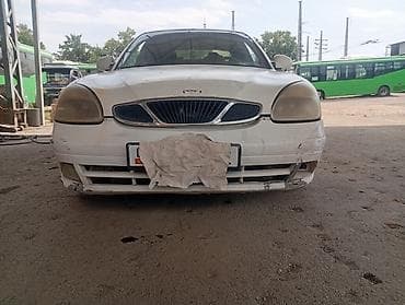 audi s 4: Daewoo Nubira: 2002 г., Механика, Седан — 3