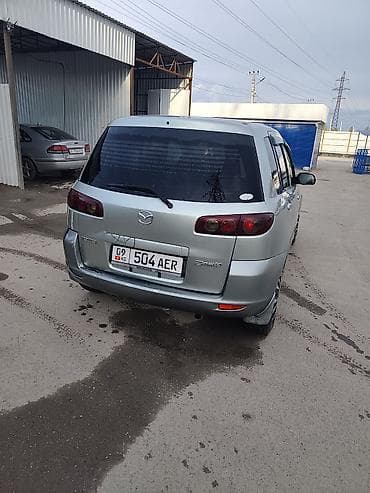 задний бампер на 124: Mazda Demio: 2003 г., 1.3 л, Автомат, Бензин, Хэтчбэк — 5