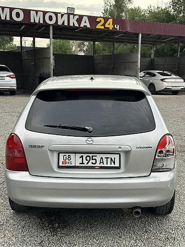 обмен на хариер: Mazda 323: 2001 г., 1.6 л, Механика, Бензин, Хэтчбэк — 5