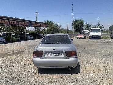 e39 540: Mitsubishi Carisma: 1998 г., Седан — 3