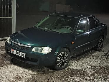 5: Mazda 323: 2000 г., 1.3 л, Механика, Бензин, Седан — 10