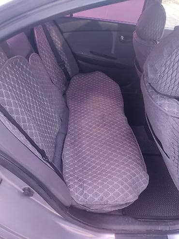 range over: Nissan Primera: 2003 г., Автомат, Газ, Седан — 7