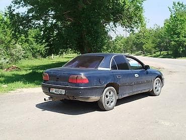 ом 605: Opel Omega: 1994 г., 1.8 л, Механика — 2
