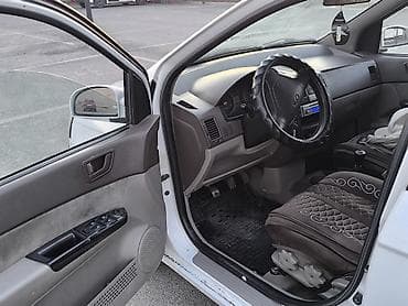 starex hyundai: Hyundai Getz: 2002 г., 1.4 л, Механика, Бензин, Хэтчбэк — 8