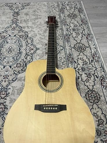 Аккордеоны: Акустическая гитара Chord (дредноут с вырезом). Характеристики и — 1