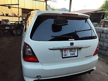 а 8: Honda Odyssey: 2001 г., Универсал — 5